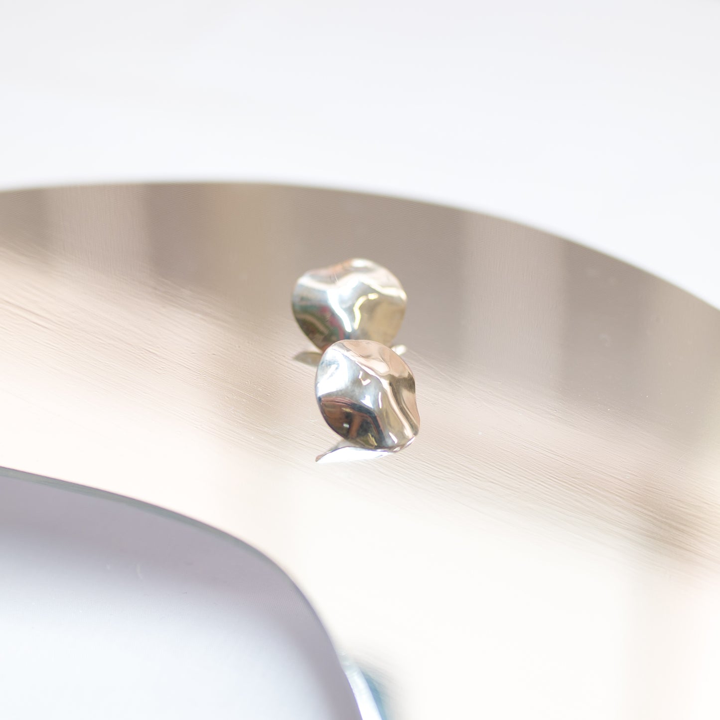 Warp shaped earrings.