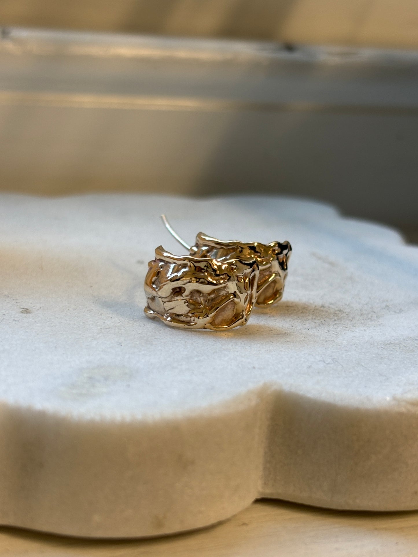 Unfined textured earrings