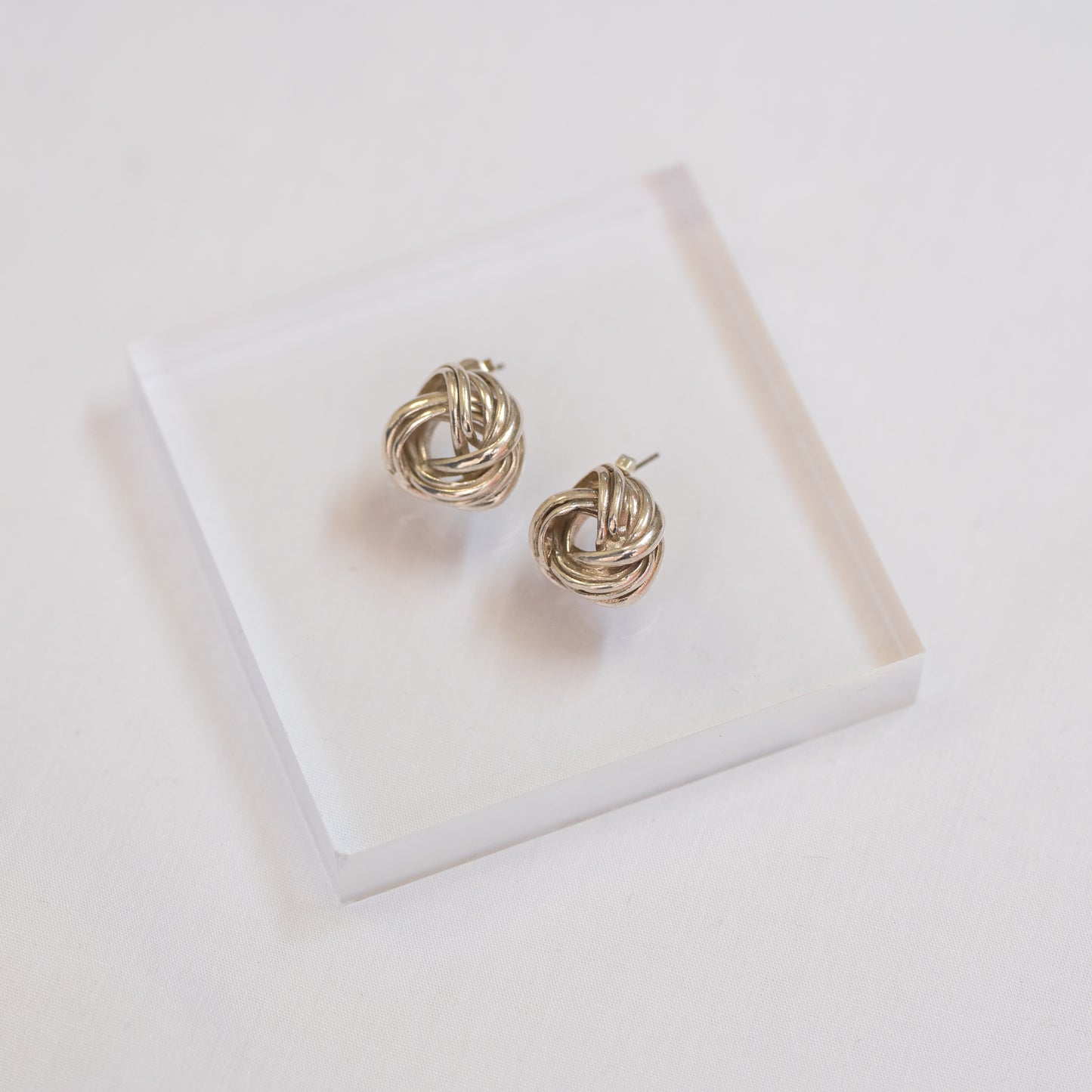 Silver embrace earrings