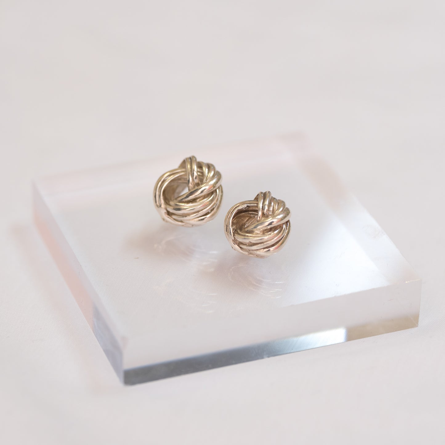 Silver embrace earrings